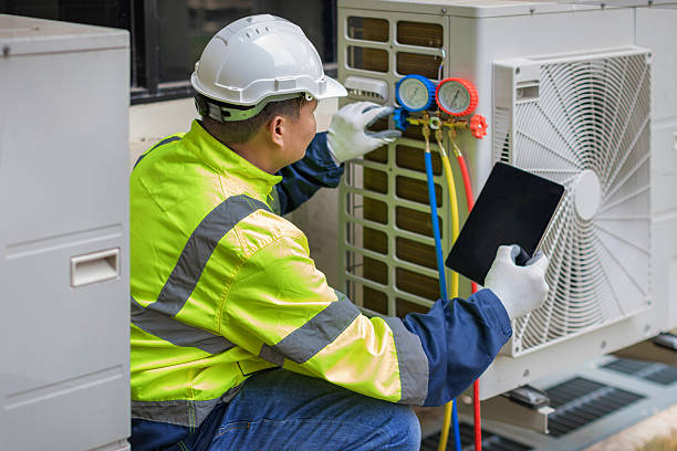 Professional Hvac technician working in Elmwood, MA